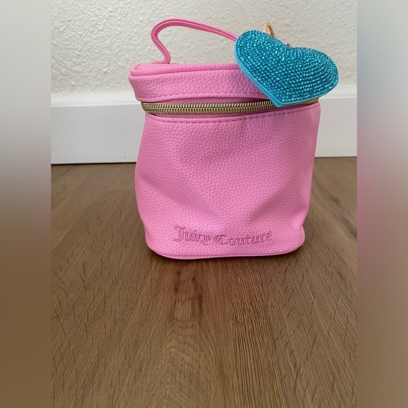 Juicy Couture Handbags - NEW Juicy Couture Pink Cosmetic Bag with Blue Heart Charm
